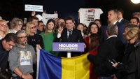 При 60% обработени протоколи в Румъния: Джордже Симион настига Никушор Дан