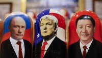Приликите и разликите в посещенията на Тръмп и Путин в Китай