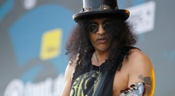 Според Слаш събирането на Guns N` Roses е в ръцете на Господ. Снимка: Reuters